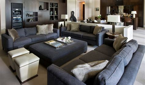Position a rounded sectional sofa around a circular area rug that s placed in the middle of a square or slightly angular contemporary large living room with sectional couch. 25 Inspiring Images of Gray Living Room Couch Designs ...