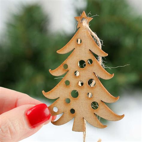 They will simply rot if planted or left in water. Unfinished Wood Laser Cut Christmas Tree Ornaments - New ...