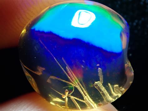 75ct Water Opal With Play Of Colour Bright Carved