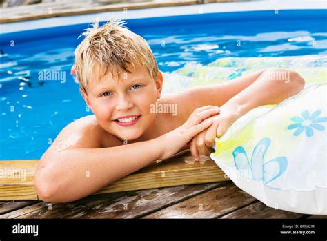 Boy Bathing In Outdoor Pool Stock Photo Alamy
