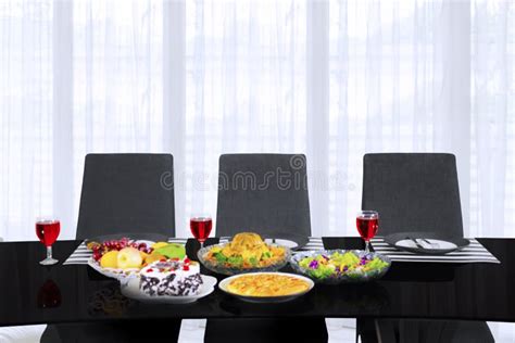 Delicious Meals Served On The Dining Table Stock Photo Image Of