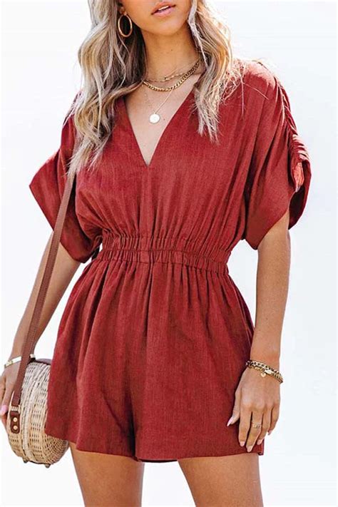pair the take a vacation romper with a straw hat and a glass of champagne to start your vacay