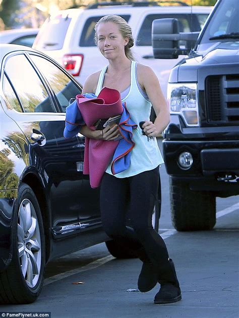 Kendra Wilkinson Struggles To Keep Surgically Enhanced Assets In Bra On Way To Gym Daily Mail