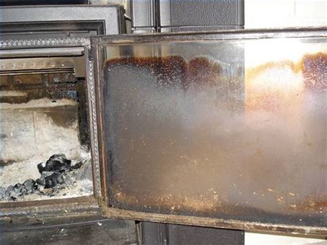 Remember to keep the blade flat, to avoid scratching the glass. How to Clean the Glass Door of a Wood Stove | Stove, Warm ...