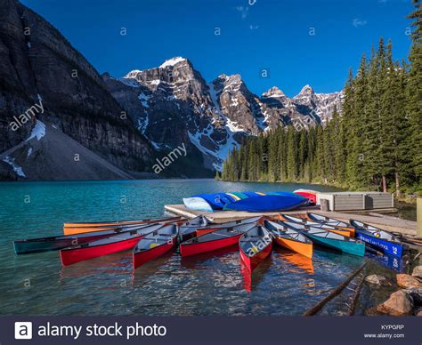 Canoes Moraine Lake Lake Louise Area Of Banff National Park Alberta
