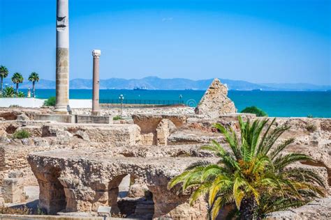 Ancient Ruins At Carthage Tunisia With The Mediterranean Sea In Stock