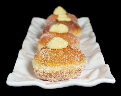 The classic italian breakfast consists of cappuccino, caffè e latte, biscotti, casserole, etc. Bomboloni - fried Italian pastry rolled in sugar and filled with Crema Pasticcera. | Food ...