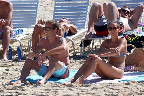 Newlywed Jessica Michibata Displays Her Pert Derriere In Thong Bikini On Beach With Husband