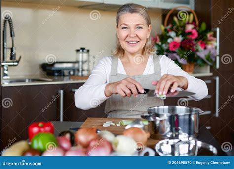 Mature Woman In Kitchen Preparing Food Stock Photo Image Of Health