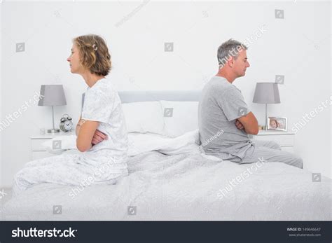 Couple Sitting On Different Sides Bed Stock Photo 149646647 Shutterstock
