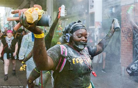 Notting Hill Carnivals Sparks Into Life As Revellers Cover Each Other