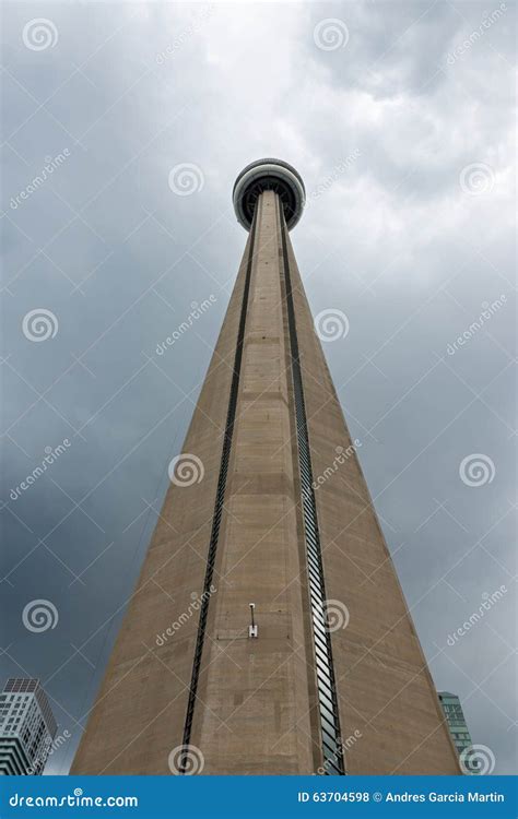 Cn Tower Against A Cloudy Sky In Toronto Canada Editorial Stock Photo