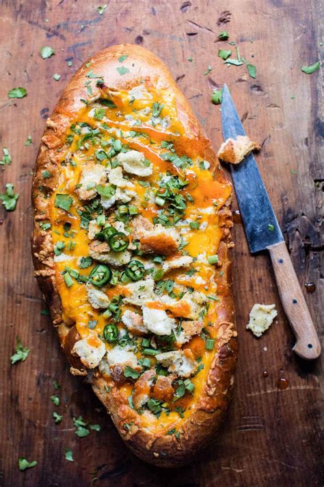 cheesy buffalo chicken stuffed french bread from half baked harvest