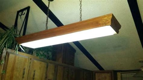 Wraparound fluorescent light covers are used on lights that hang down from the ceiling but don't have a decorative frame. DIY Fluorescent Light Covers | Fluorescent light covers, Fluorescent light covers diy ...