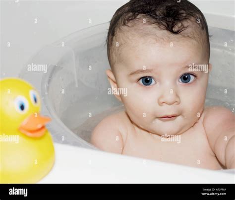 Baby In Bath Tub Stock Photo Alamy