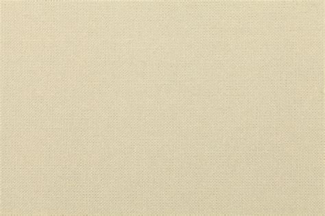 Premium Photo Light Beige Background From A Textile Material Fabric