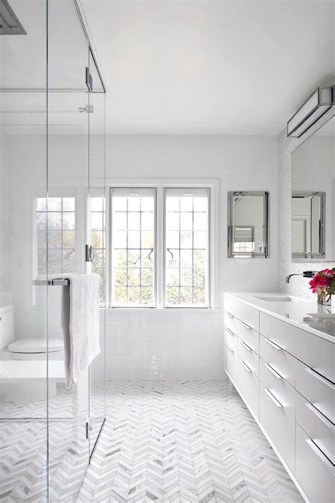 Distinctive light fixtures make a style statement in the bathroom. 11 Bright White Bathrooms | Modern master bathroom ...