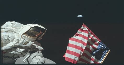 Astronaut Harrison Schmitt Poses On The Lunar Surface Next To An