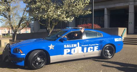 Why did Salem Police unveil a blue car?