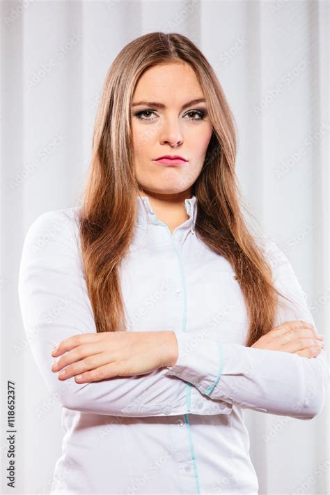 Angry Business Woman With Crossed Arms Stock Photo Adobe Stock