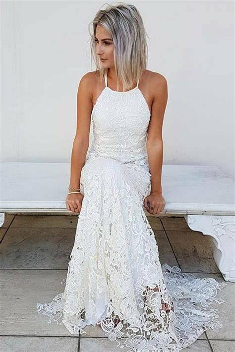 Ahh, simple wedding dresses—proving decade after decade that clean lines and a striking fabrication make for a truly timeless bridal look. Buy Simple Halter Mermaid Lace Appliques Wedding Dress ...
