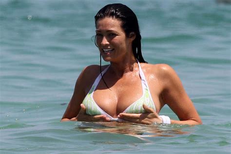 manuela arcuri exposing her huge tits on beach and posing sexy in bikini paparaz porn pictures
