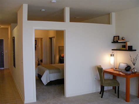 Your bedroom should be the coziest room in your house, so take it there with textile wall hanging. Loft Apartment, MetroPointe at Wheaton by dan reed!, via ...