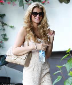 amy willerton stands out in embellished floral jumpsuit as she soaks up the sun in la daily