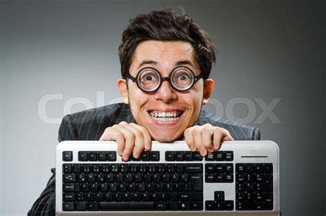 Computer Geek With Computer Keyboard Stock Image Colourbox