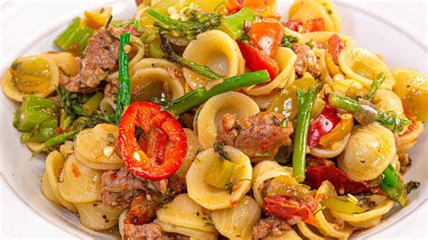 Cover and simmer for 7 minutes or until shells open. Sausage Broccolini Peppers and Onions with Pasta Recipe ...