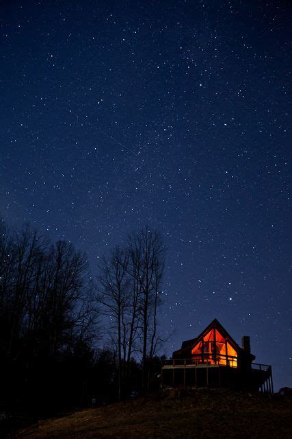 Warm Cabin In The Woods On A Cold Clear Starry Night Starry Night