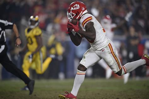 Hill was running into the end zone. Chiefs' Hill fined $10K by NFL for peace sign gesture ...