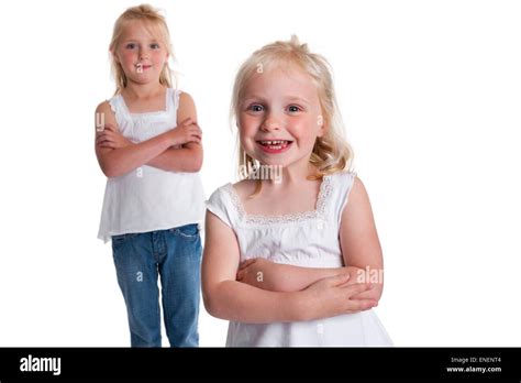 Portrait Of Two Blond Sisters On White Background Stock Photo Alamy