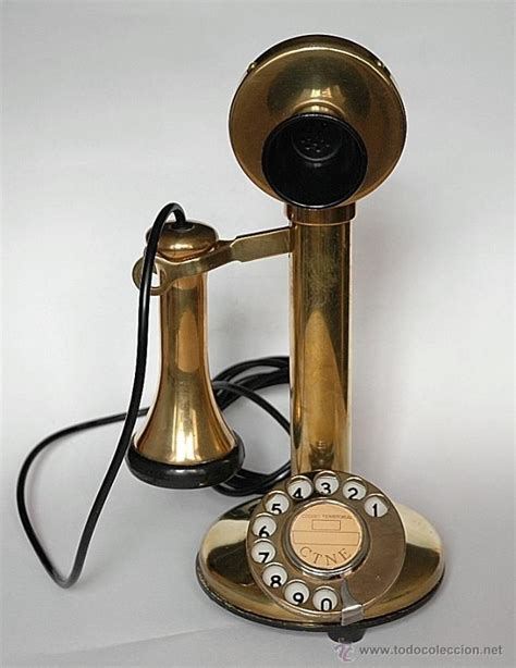 TELÉFONO ANTIGUO TIPO CANDELABRO EN BRONCE Teléfono antiguo Telefono