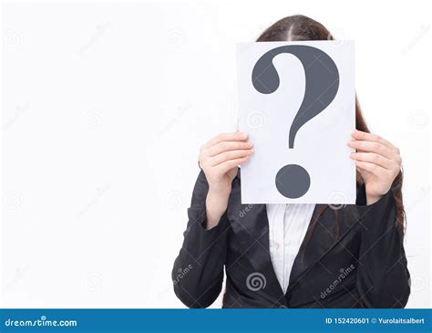 Young Business Woman Covering Her Face With A Question Mark Stock