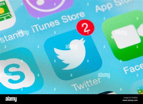 Twitter Logo Icon In Mobile Screen Stock Photo Alamy