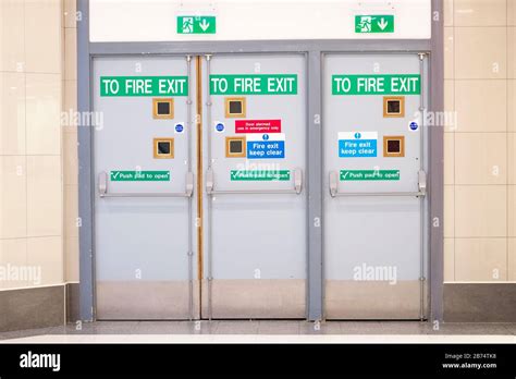 Fire Exit Glass Door At Indoor Shopping Mall For Emergency Use Stock