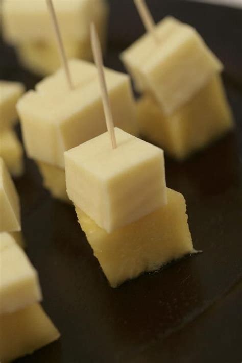 The best thing about food on a stick is that they make perfect snacks for parties and they're easy finger foods. Cheese and pineapple cubes on cocktail sticks. Usually ...
