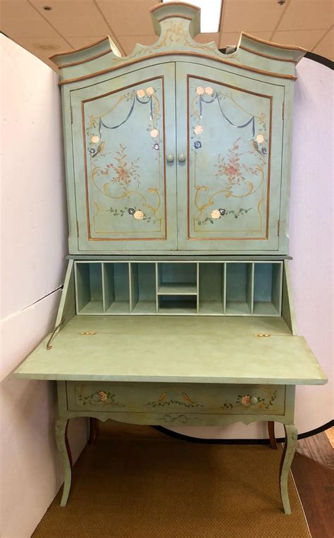 Painted in white, this wooden secretary desk with hutch will be a perfect working station for one's home office. French Hand-Painted Secretary Desk, 20th Century ...