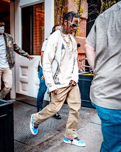 Spotted Travis Scott Steps Out In Raf Simons And Air Jordan Trainers