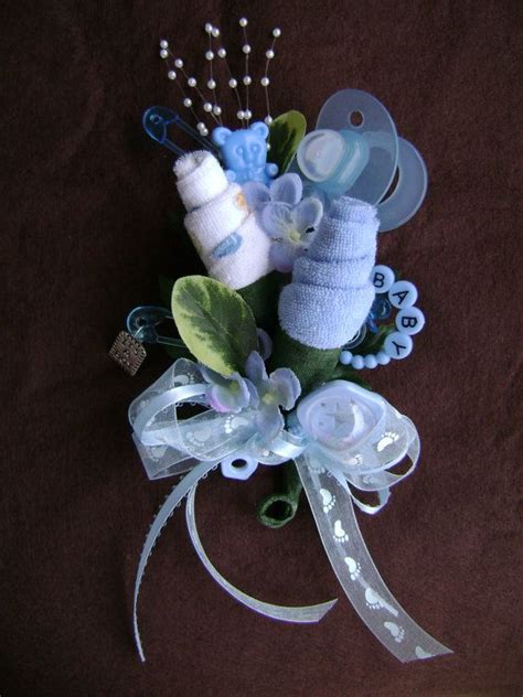 I love seeing all the different themes for showers now, they have gotten so creative. Baby Shower Corsage / Baby Boy Washcloth Corsage /Blue ...