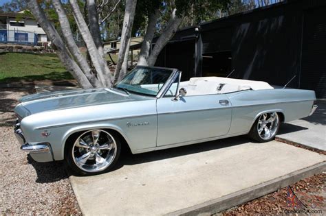 This car is a 1966 nova convertible with a 1967 front end on it. 1966 Chevrolet Impala Convertible 350CI 700R 20"S Power ...