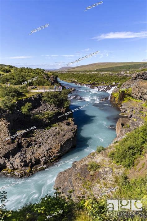 Hraunfossar A Series Of Waterfalls Pouring Into The Hvítá River