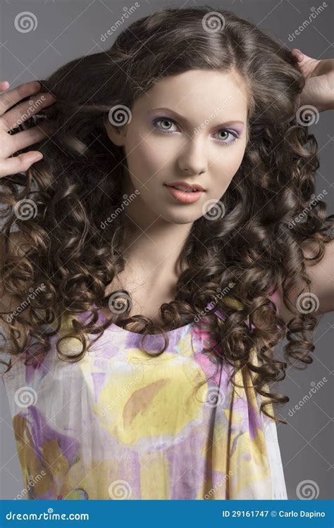 Pretty Brunette With Curly Hair Smiles Stock Image Image Of Face