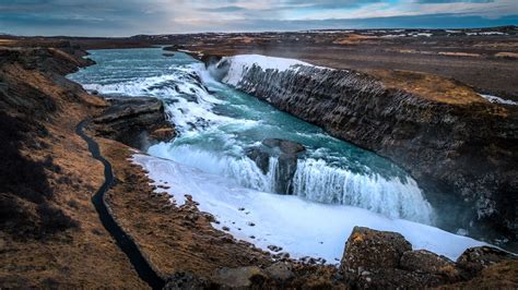 The Magnificent Waterfall Of Gullfoss Marks The Edge Of The Highland