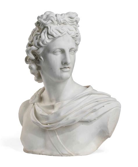 A Carved Marble Bust Of The Apollo Belvedere After The Antique