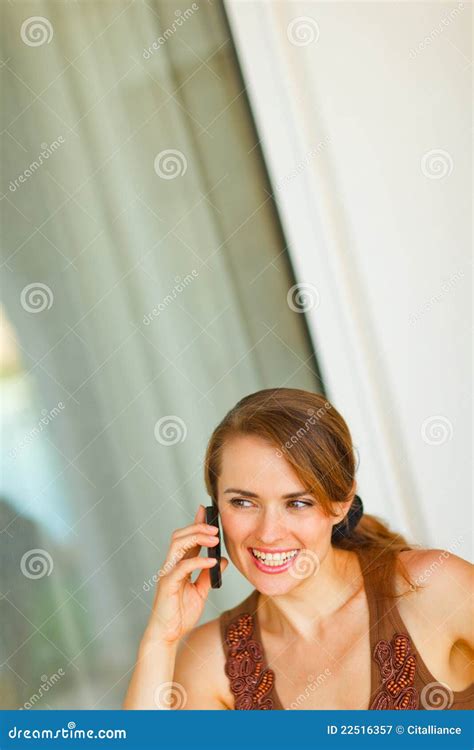portrait of beautiful woman speaking mobile phone stock image image of glee beautiful 22516357