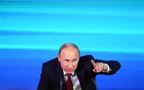 Russia's Vladimir Putin strikes harsh tone during marathon annual news 