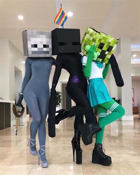three people dressed up as minecraft characters