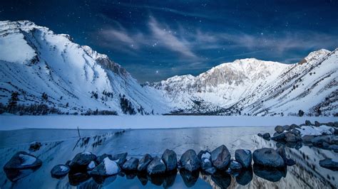 1366x768 Resolution Snowy Mountains At Starry Night 1366x768 Resolution